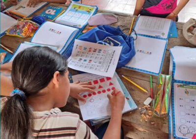 A student going through her workbook in class, Chile.