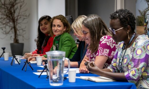 Photo of a panel of women speakers