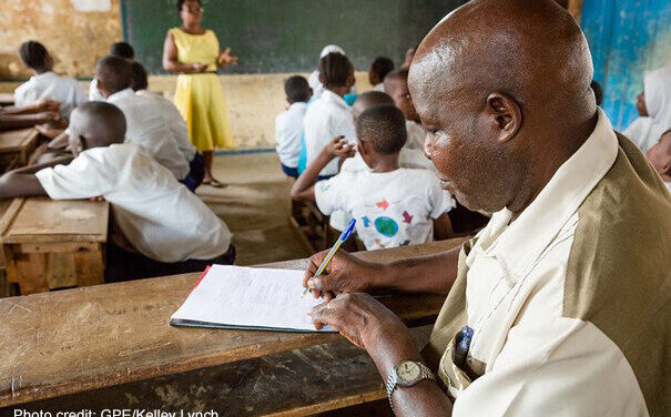 A teacher and students in class at the Nyamachaki Primary School, Nyeri County, Kenya.