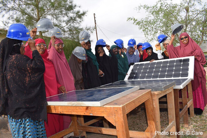 Green skills Participants in BRIDGES project with hard hats and solar panels