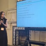 Srinidhi Lakshmanan presenting at the UKFIET 2025 conference.