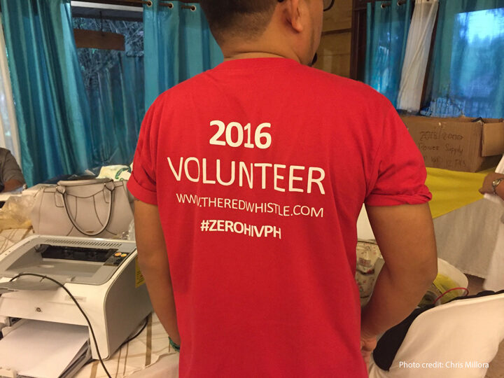 Volunteering Person wearing a red TShirt with 2016 Volunteer on the back