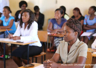 Teachers sit in a classroom for training, DRC.