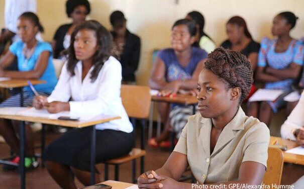 Teachers sit in a classroom for training, DRC.