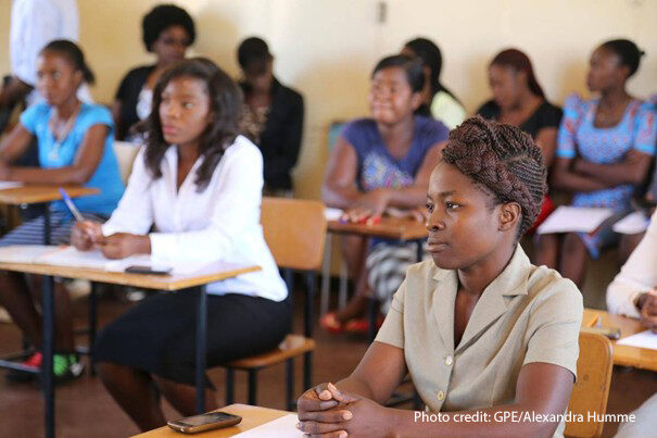 Teachers sit in a classroom for training, DRC.