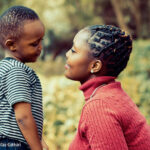 Mother and young child looking at each other in a caring way