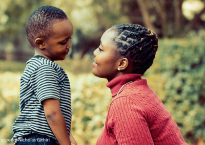 Mother and young child looking at each other in a caring way