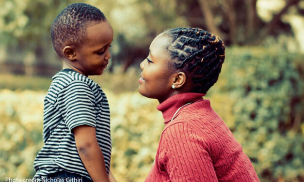 Mother and young child looking at each other in a caring way