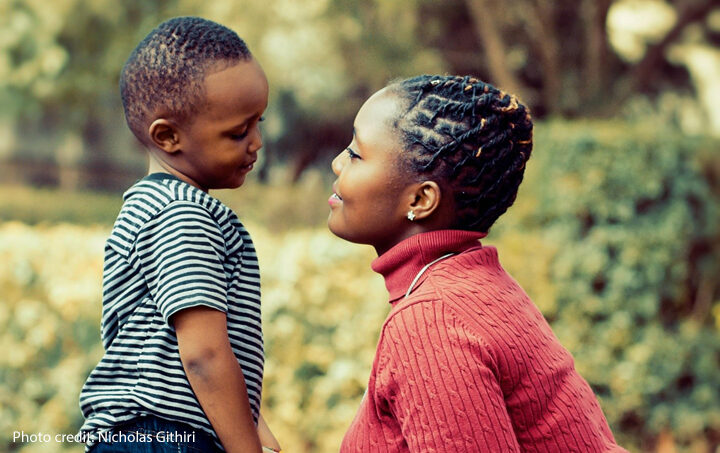 Mother and young child looking at each other in a caring way