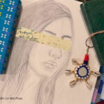 sketch of a girl (Thiri) with a band covering her eyes.