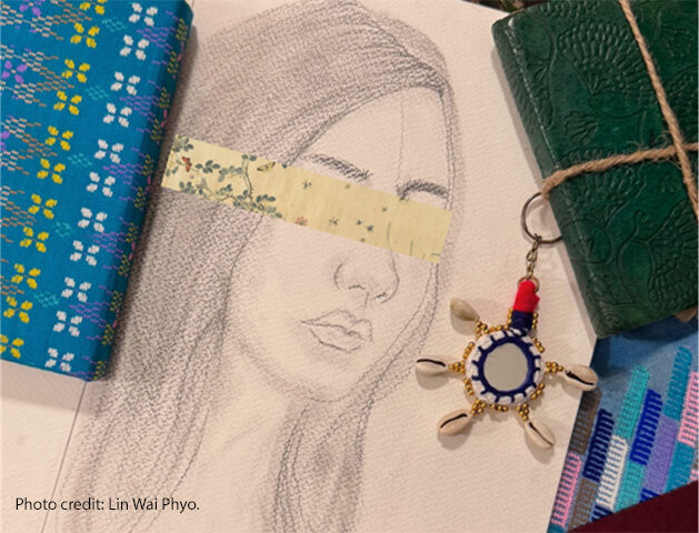 sketch of a girl (Thiri) with a band covering her eyes.