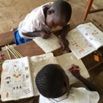Two students in math class, Kenya