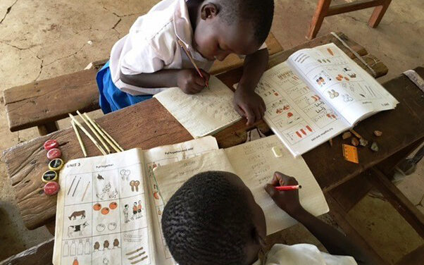 Two students in math class, Kenya