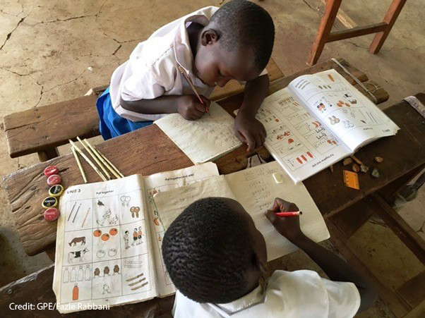 Two students in math class, Kenya