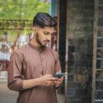 Young man looking at a mobile phone