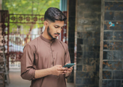 Young man looking at a mobile phone