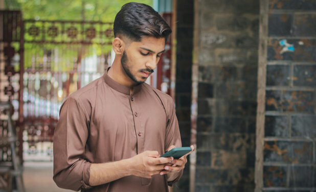 Young man looking at a mobile phone