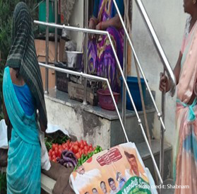 Women at a doorstep