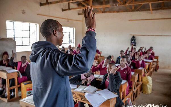 A teacher and his class, Kenya.