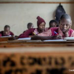 students sit in a maths class, Kenya.